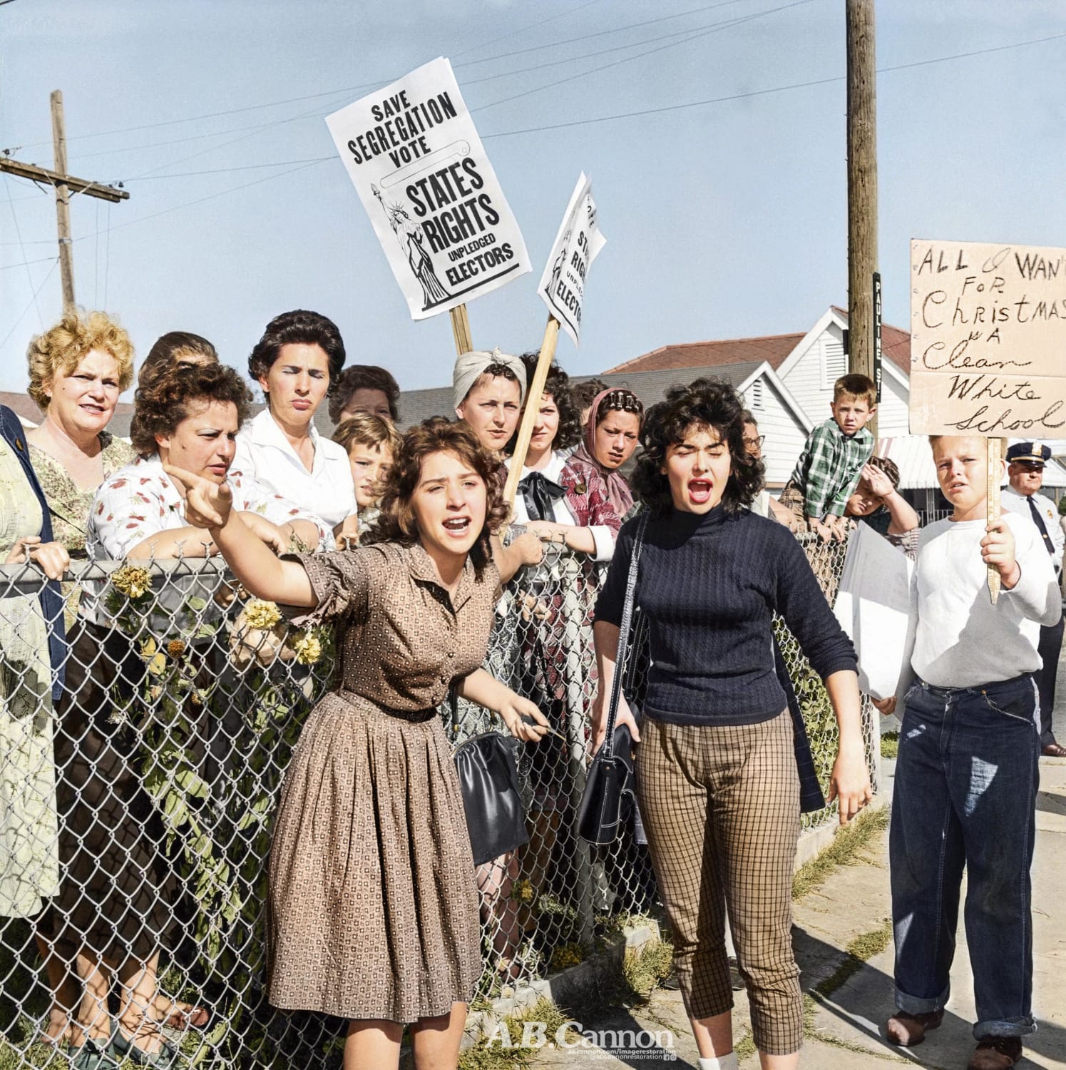 A crowd of angry parents hurl insults at 6 year-old Ruby Bridges as she enters a traditionally all-white school, the first black child to do so in the United States South, 1960. Bridges is just 67 today. (Colorized by me)