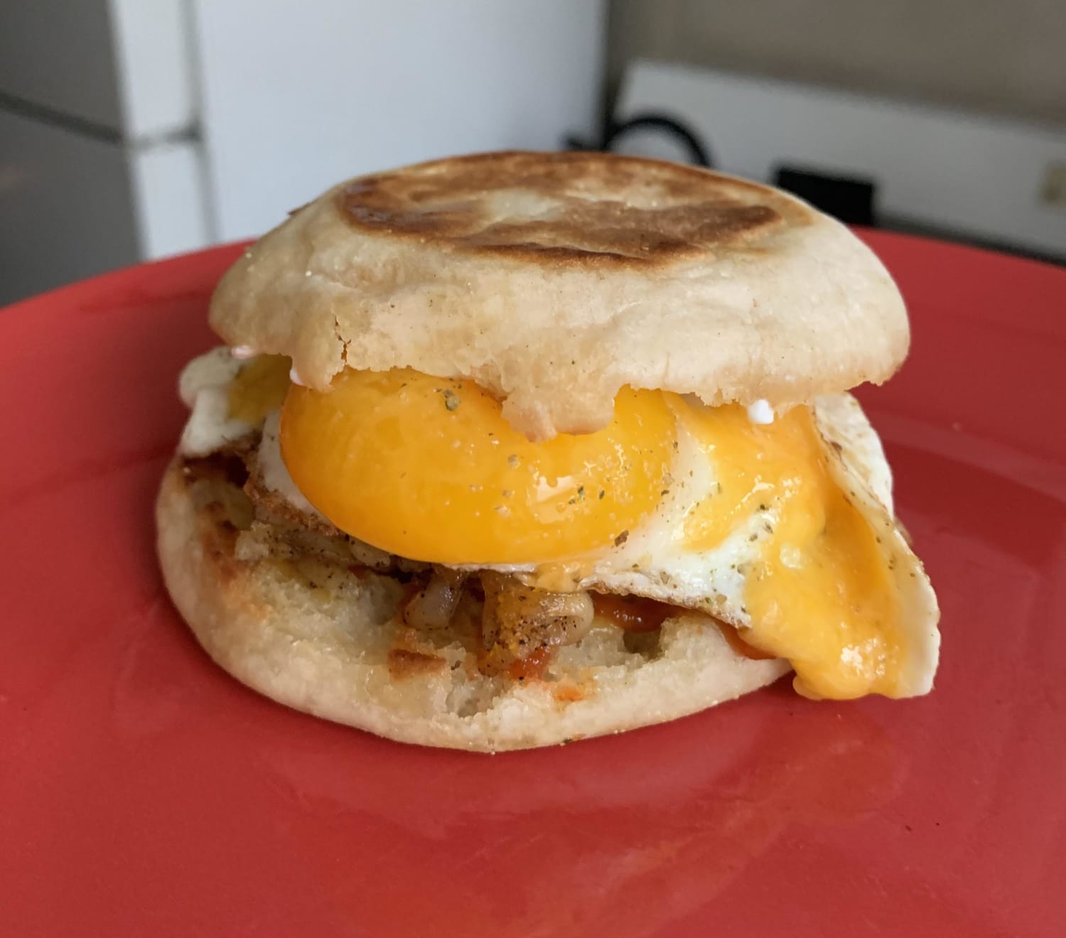 Fave Breakfast Sandwich - sriracha, hash browns, cheddar, and a lovely fried egg