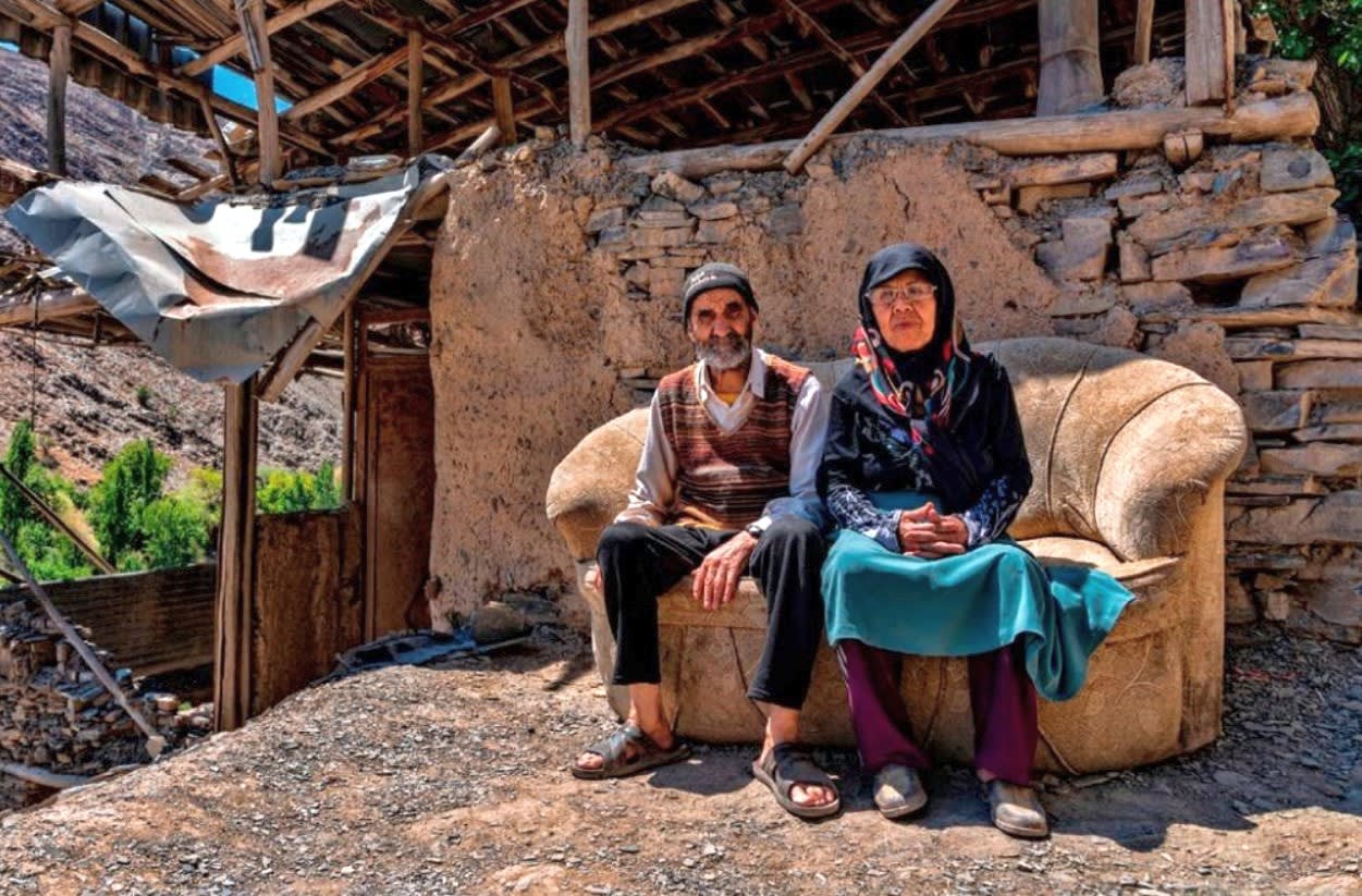 Elderly couple taking a seat in the sun, Iran. (Image - Ali Sabih Kadhim).