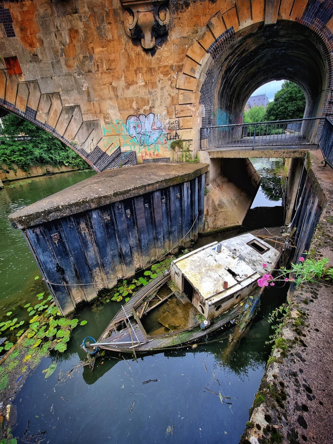 Abandoned Boat in the River Avon, Bath, UK.
