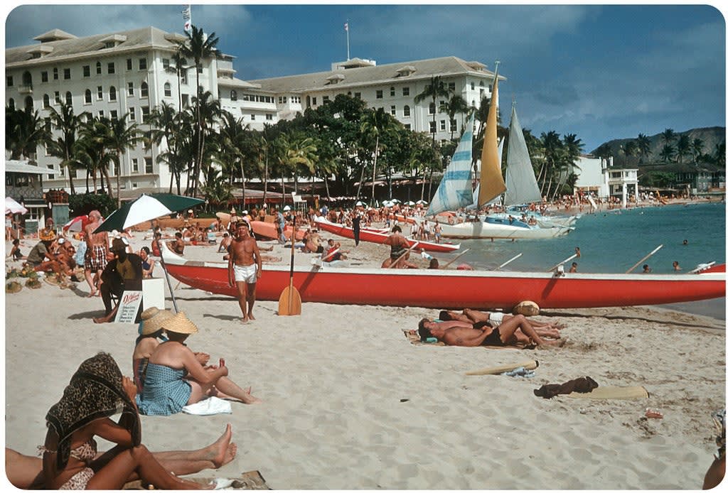 1959 Waikiki Beach, Honolulu, Hawaii. In background is the Moana Hotel, considered to be the First Lady of Waikiki.