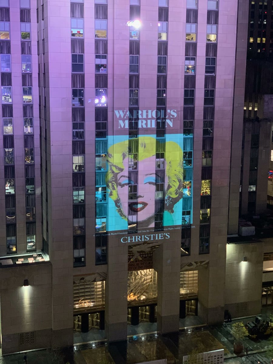 For the next two weeks, Christie's will project Andy Warhol's portrait of Marilyn Monroe onto the facade of Rockefeller Center: