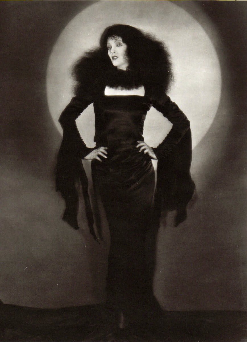 Officially going full spooky season from now through Halloween. Myrna Loy proves a classic costume never goes out of style in this witchy photo shoot, circa 1929.