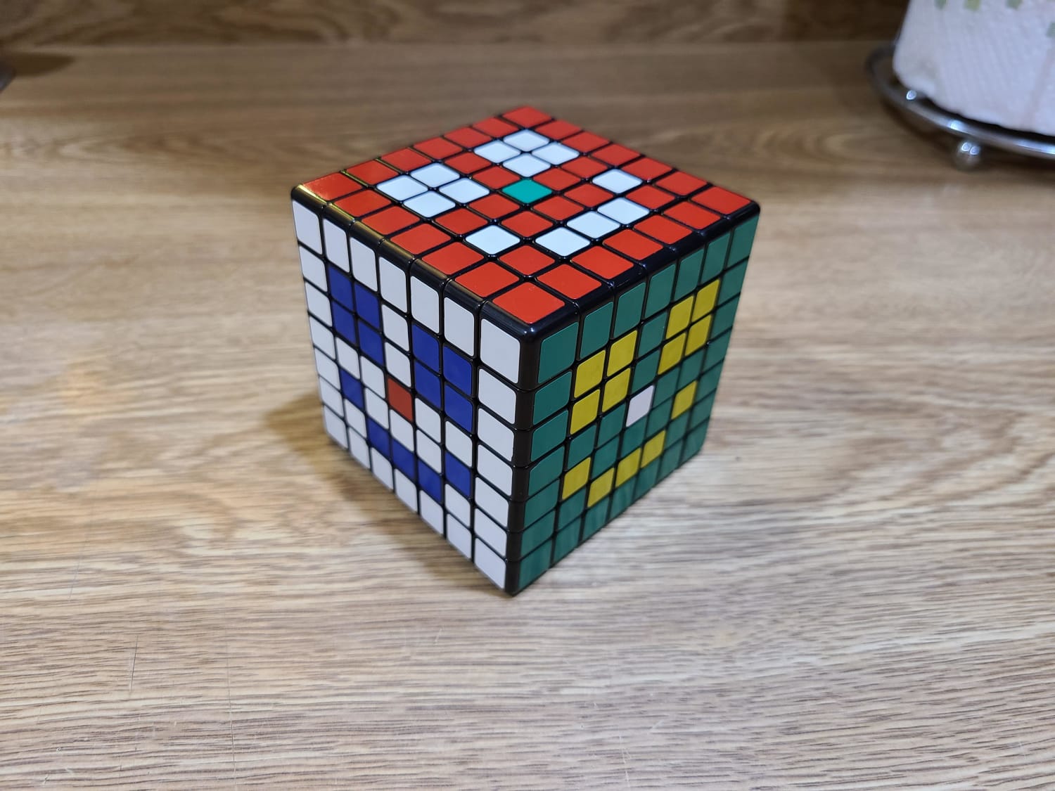 A friend of mine "solved" a clown face into each side of this giant Rubik's cube.