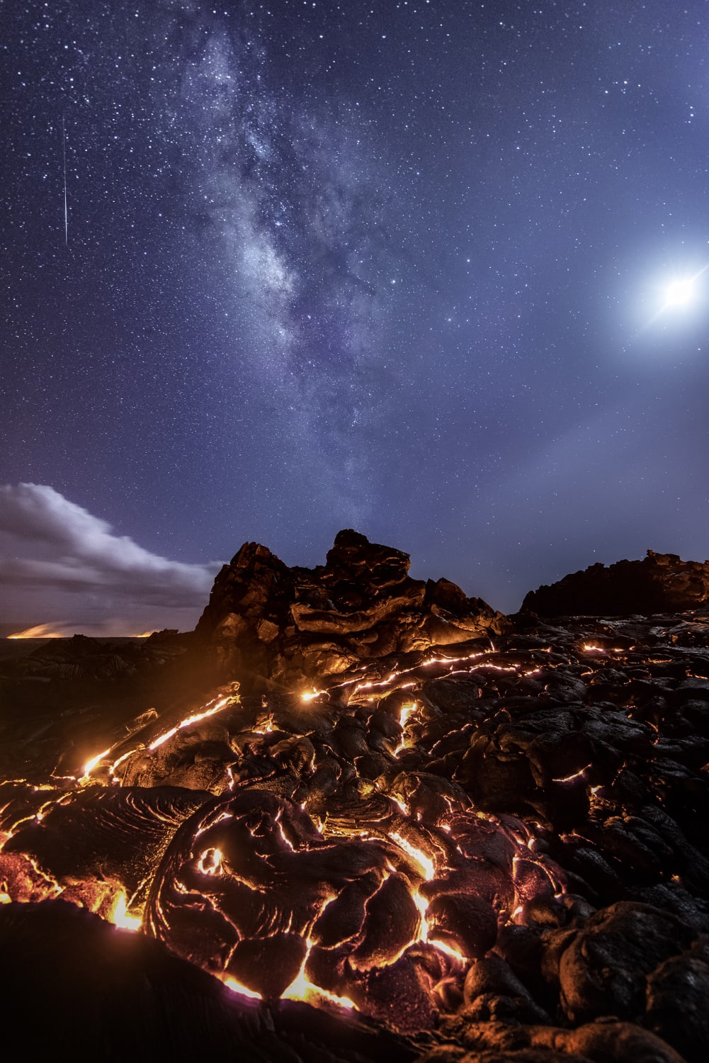 This photo shows Lava, our Galaxy and a Meteor all at once. Kilauea Volcano, Hawaii. By Mike Mezeul II .