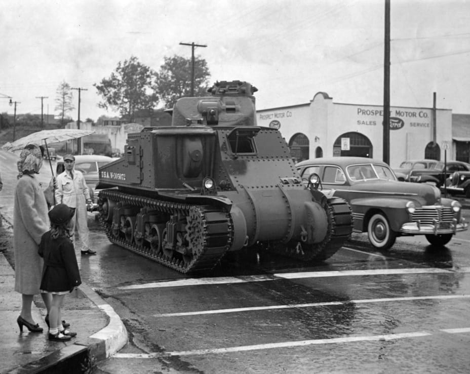 Medium Tank M3 is driving from the factory to its place of service. The armament is not yet installed. Detroit, USA, 1941 or 1942