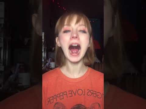 Girl Rolls Her Tongue Backwards - 1271343