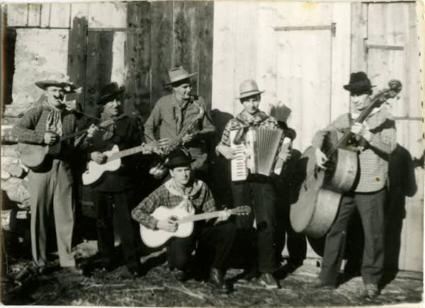 "Tamburaši" local town band from Prezid, Yugoslavia, pose for a picture (1955)