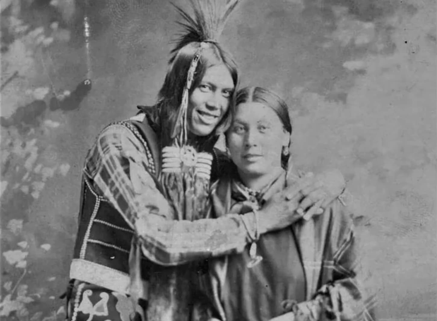 A Native American man embraces a woman, unknown date
