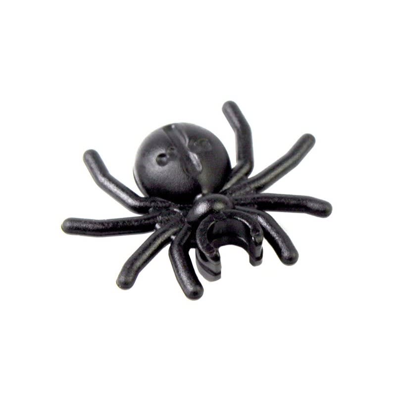 Why does the old Lego spider piece have a cross on its abdomen?
