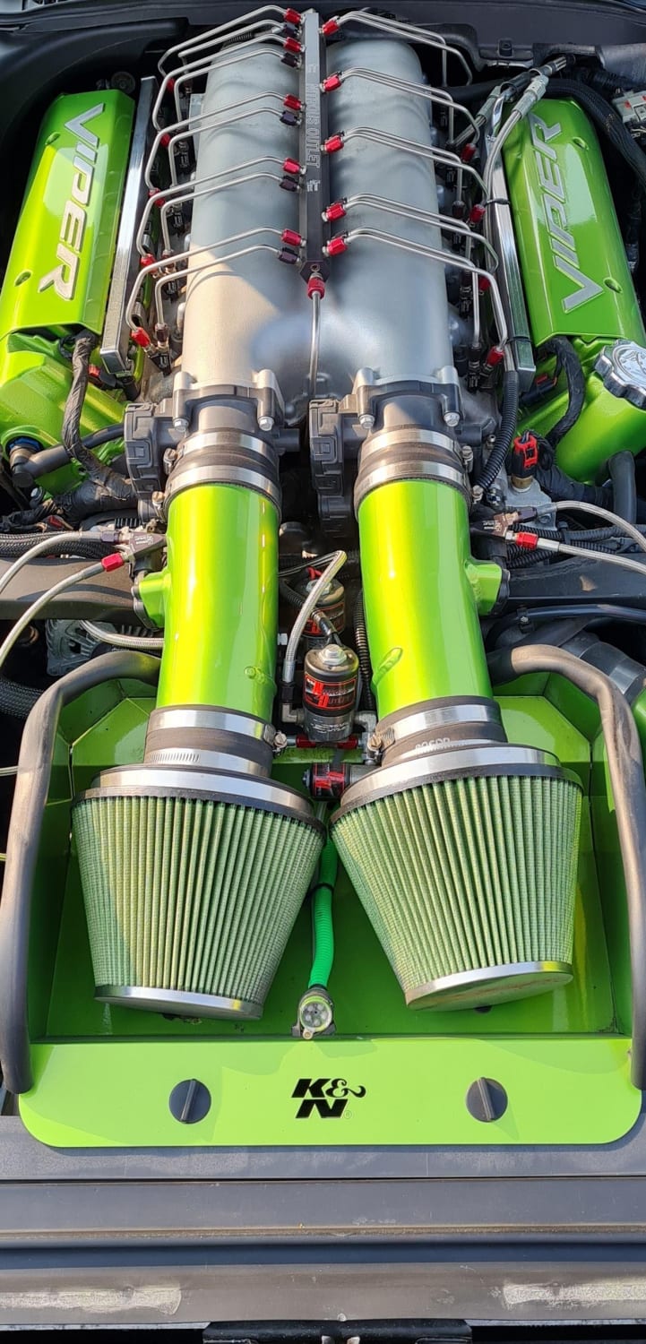 This engine in a Viper RT/10 I saw yesterday. It has nitrous purge that blows out the front like snake venom through that green hose between the intake filters.