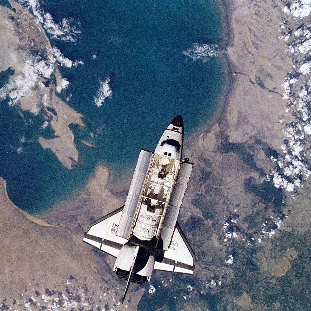 Space Shuttle Atlantis is seen from the Mir-18 crew members aboard Russia's Mir Space Station. June 1995