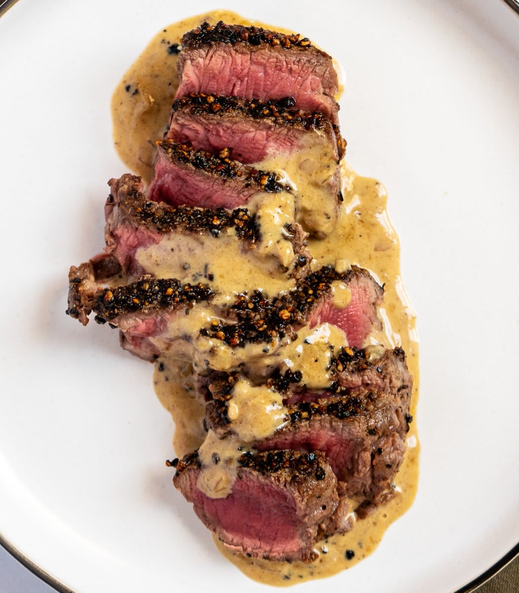 Steak au poivre has become a bistro mainstay for good reason. Lean, mild-flavored filet mignon might appear to be center stage, but make no mistake: This dish is all about the peppercorns and Cognac cream pan sauce:
