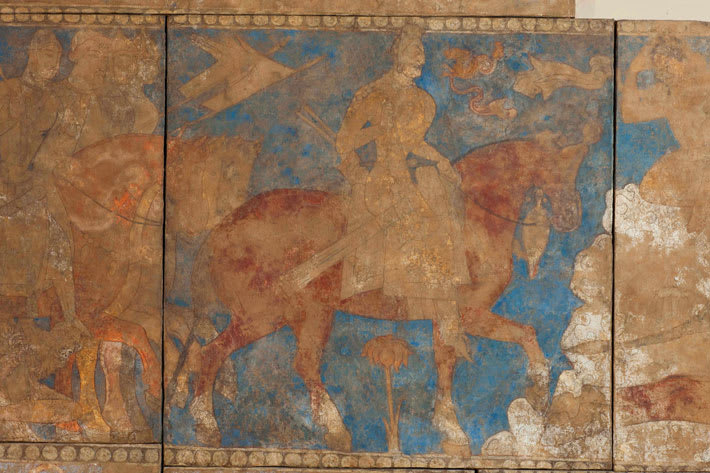 The Iranian hero Rustam leads his army into battle against demons in this mythological mural from a banquet hall unearthed at Panjakent in Tajikistan, a city built by the Sogdians, who dominated trade on the Silk Road from the 5th to 8th century A.D.