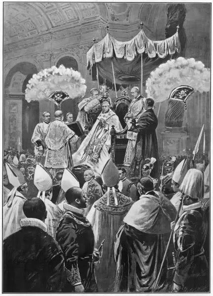 Pope Pius XI is crowned in Rome, with Cardinal Gaetano Bisleti placing the Papal tiara upon Cardinal Achille Ratti’s head.