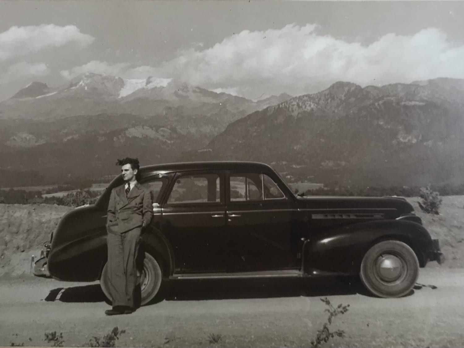 Grandpa Ray with his ‘39 Plymouth en route to Taxco, Oaxaca all the way from St. Paul, Minnesota in 1941. Photo taken outside Mexico City; Mt Iztaccihuatl in the background.