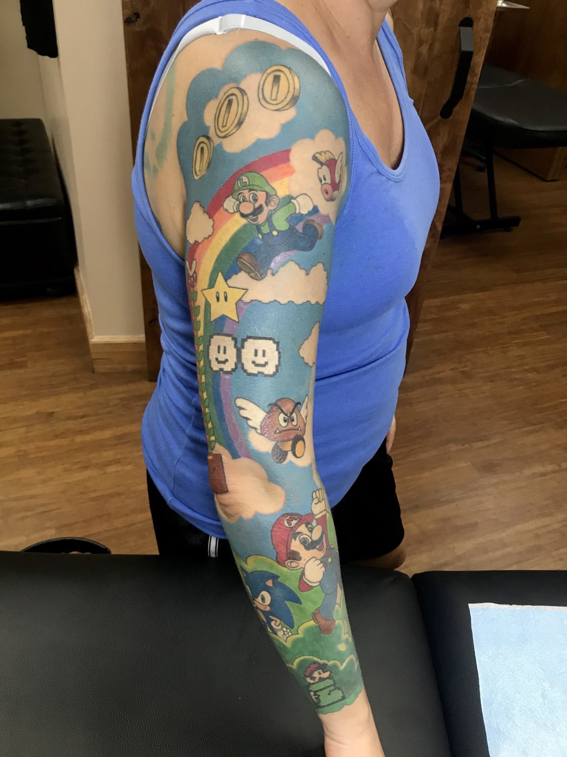 Super Mario (mostly) sleeve by Jennifer Bradbury at Skin Deep Tattoo Waikiki in Honolulu Hawaii. Some Mega Man, Zelda and Sonic references sprinkled in as well.