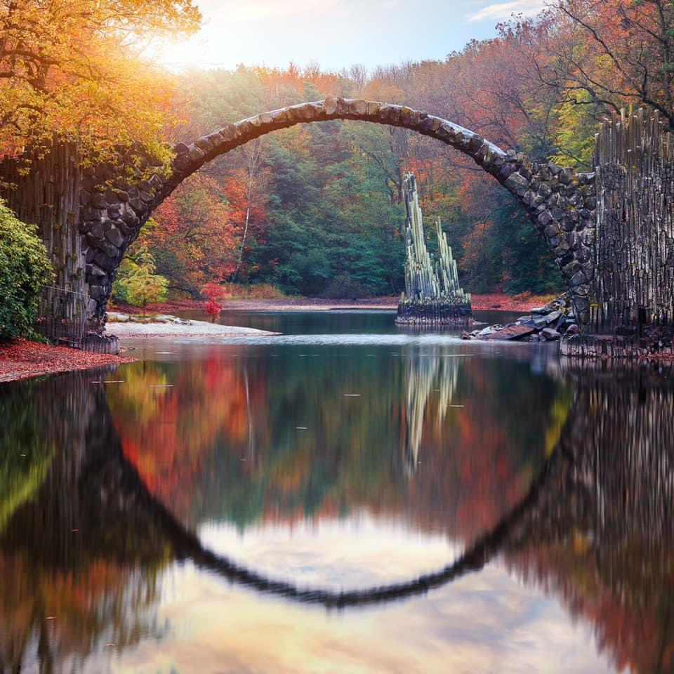 Rakotzbrücke Devil's Bridge, Kromlau, Germany, was designed to create a near perfect circle when reflected by the water beneath it.