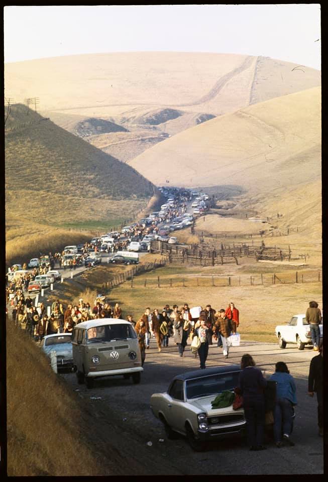 Some of the 300,000 attendees walking to free concert at Altamont Speedway, December 6th, 1969. The violence associated with the concert (and a stabbing by Hell's Angel 'security') caused this concert to be known as the 'Death of the Hippie Dream'.